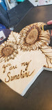 'You are my Sunshine' wood carving By Valerie Doyon