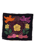 Embroidered patch with birds, flowers, and a heart design on a black background